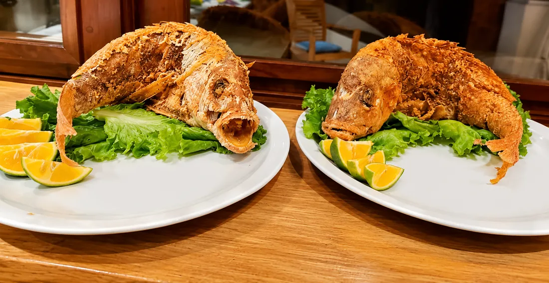 Crispy whole fried fish with citrus